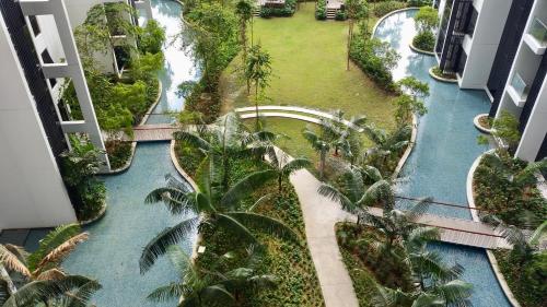 an aerial view of a waterway in a resort at M City Ampang KLCC Lake view Pool in Kuala Lumpur