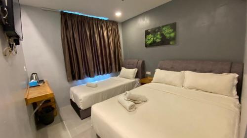 Katil atau katil-katil dalam bilik di G9 Hotel Alor Setar