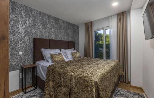 Postel nebo postele na pokoji v ubytování Beautiful Villa Amelie in Opatija