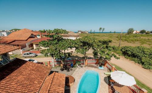 Bazén v ubytování Pousada Aratuca - 200mt da praia nebo v jeho okolí
