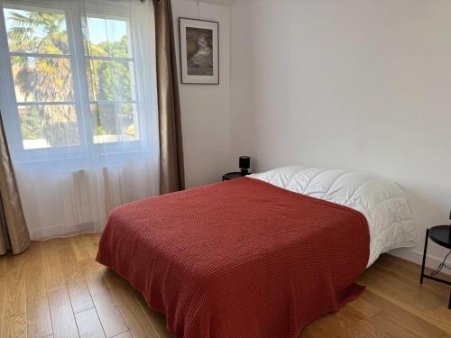 Giường trong phòng chung tại L'Olivette,Garage, Jardin, Proche centre-ville