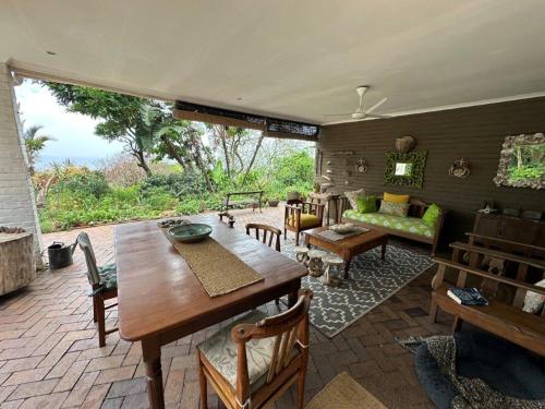 Et opholdsområde på Umdloti Cottage on 5th Avenue