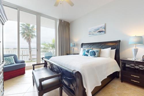 Ένα ή περισσότερα κρεβάτια σε δωμάτιο στο Caribe C103