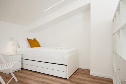 Ένα ή περισσότερα κρεβάτια σε δωμάτιο στο Keys of Sicily - Residence Verde sul mare