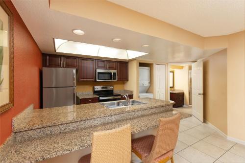 a kitchen with a large island in a room at Westgate Vacation Villas Resort in Orlando