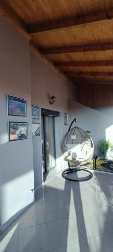 a museum with a large glass sculpture in a room at La Maison Attawba in Beni Mellal