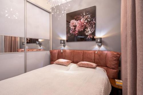 Giường trong phòng chung tại Soleil - shine of the old town, parking & sauna