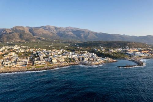 an aerial view of a town on the ocean at Ascuri Studio in Sissi