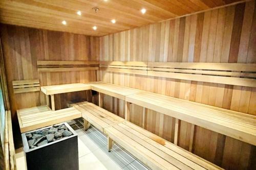 a sauna with wooden benches in a room at Melbourne CBD Southern Cross Collins St Skyline View Balcony in Melbourne
