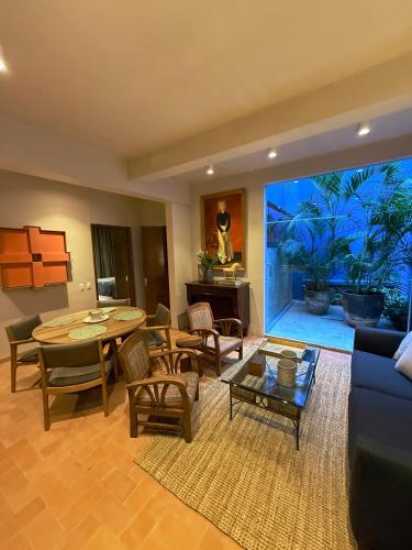 a living room with a couch and a table at Parque Juan Diego in Guadalajara