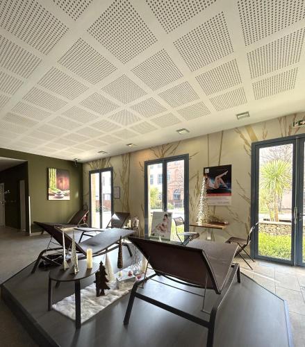TV o dispositivi per l'intrattenimento presso Dali Hôtel Montauban