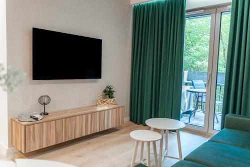 Μια τηλεόραση ή/και κέντρο ψυχαγωγίας στο K&M Apartments Tauron Arena