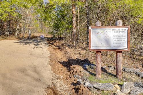 a sign on the side of a dirt road at Chic Farmhouse, 3Mi to Lake-Pet Friendly and Golfing in Eureka Springs