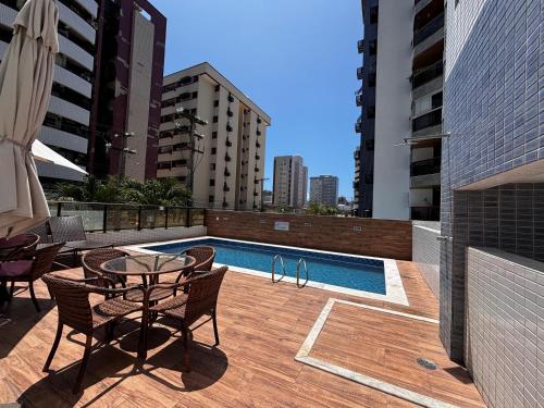 Bazén v ubytování Apartamentos 250m da Orla -Edifício Nugali- Castelo B Temporada nebo v jeho okolí