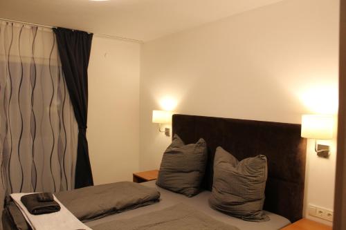 Katil atau katil-katil dalam bilik di Burghotel - Das Original