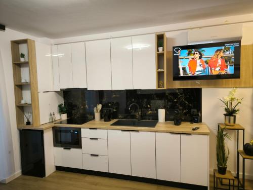 Dapur atau dapur kecil di Mirage Apartments