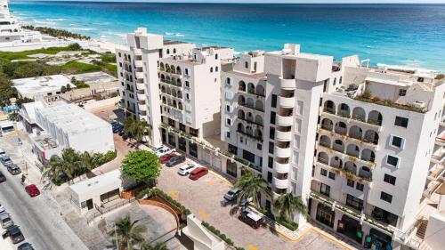 an aerial view of buildings and the ocean at Marlin by Andiani Travel in Cancún