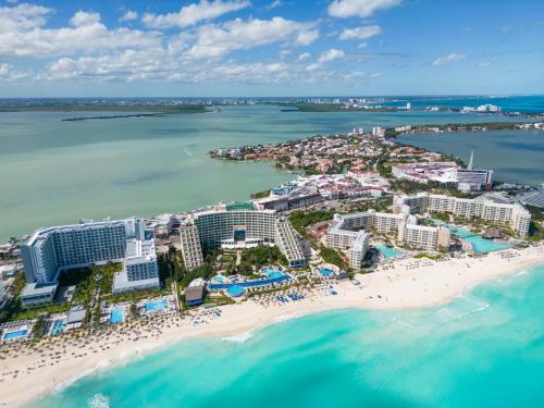 an aerial view of a resort on the beach at Marlin by Andiani Travel in Cancún