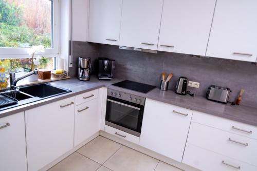 Η κουζίνα ή μικρή κουζίνα στο Garten apartment 2