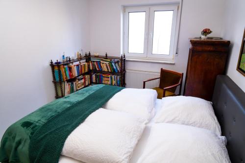 Ένα ή περισσότερα κρεβάτια σε δωμάτιο στο Garten apartment 2