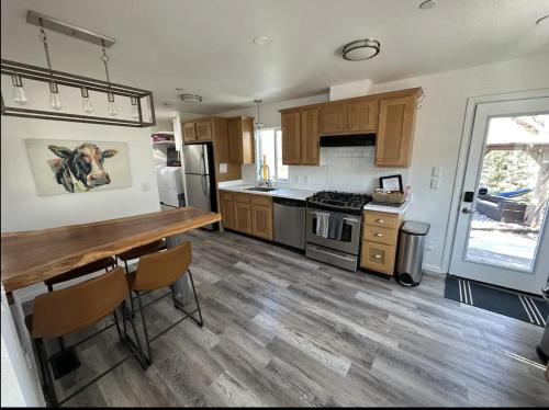 a kitchen with a wooden counter top in a house at Spectacular vineyard views in Geyserville