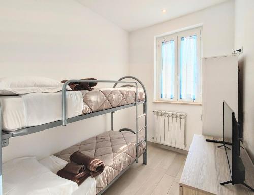 Ένα ή περισσότερα κρεβάτια σε δωμάτιο στο La Vie est Belle