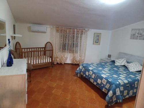 Letto o letti in una camera di Casa vacanze Su Patthiu
