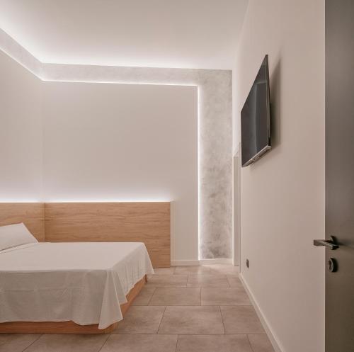 Letto o letti in una camera di Cuencaloft Calderón Relax con Jacuzzi