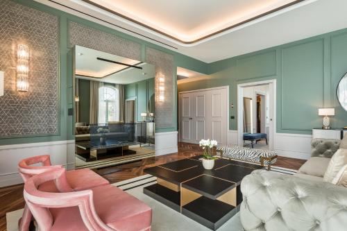 a living room with a couch and a table at Maison Albar - Amoure in Braga