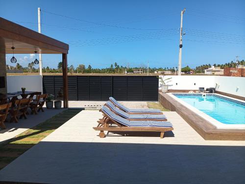Πισίνα στο ή κοντά στο Casa beach Japaratinga