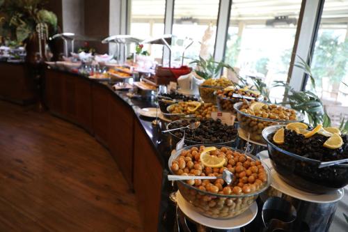 a buffet line with many different types of food at Crowne Plaza Kayseri by IHG in Kayseri