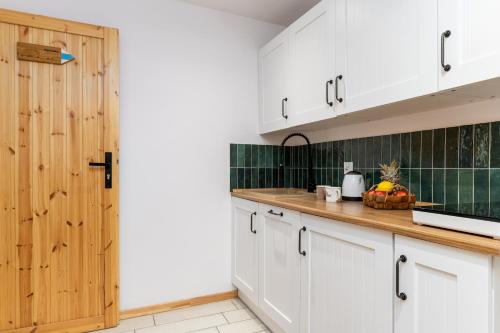 Dapur atau dapur kecil di W deSki dom apartamenty