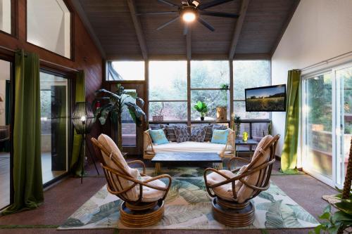a living room with chairs and a couch at Luxe Boutique-Style Home w/Indoor Hot Tub in Sedona