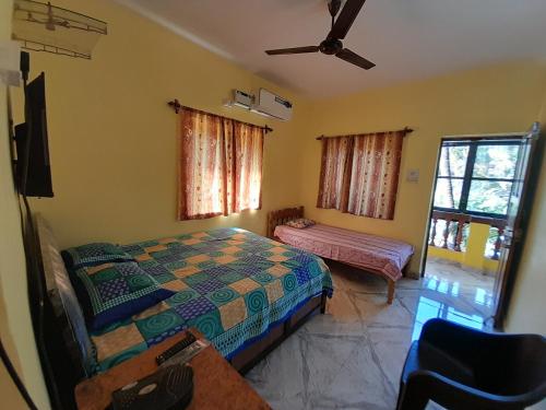 Postel nebo postele na pokoji v ubytování SelRost Guesthouse