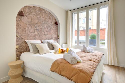 Postel nebo postele na pokoji v ubytování 201 Suite Anne - Superbe appartement