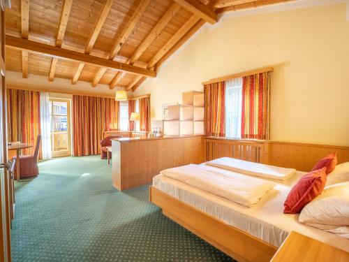 Postel nebo postele na pokoji v ubytování Hotel Keindl