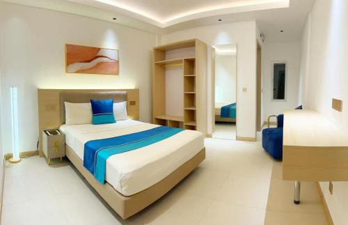 Postel nebo postele na pokoji v ubytování Aqua Heaven Inn
