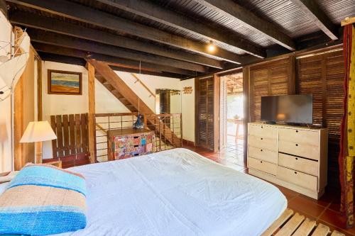 Katil atau katil-katil dalam bilik di Residence Picinguaba