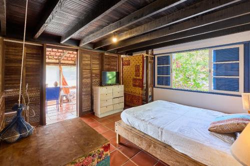 Katil atau katil-katil dalam bilik di Residence Picinguaba