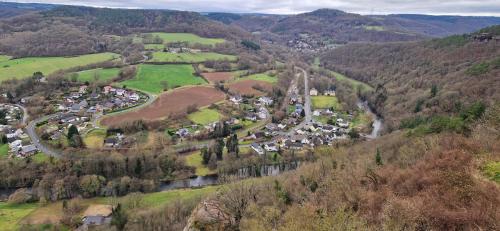 an aerial view of a village in the mountains at Panorama Eifel View in Nideggen