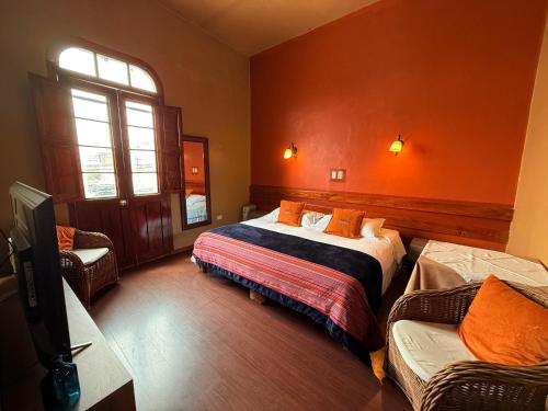 Ένα ή περισσότερα κρεβάτια σε δωμάτιο στο La Casona de Palacio Viejo