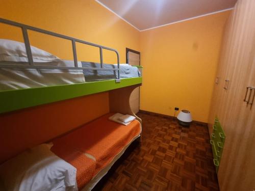 Ένα ή περισσότερα κρεβάτια σε δωμάτιο στο Casa Via Asti