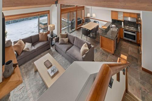 an overhead view of a living room and a kitchen at Montebello by Whistler Premier in Whistler