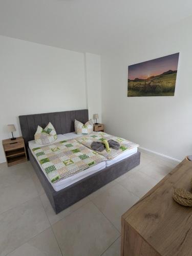 a bedroom with a bed with a banana on it at Ferienwohnung "EDDI" in Hohnstein