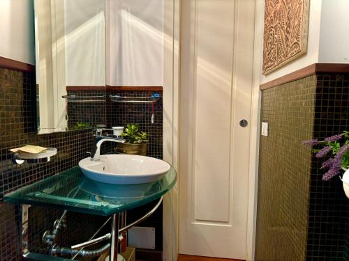 A bathroom at House Maximo at Colosseum