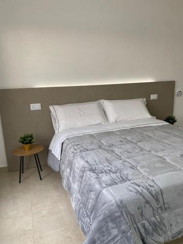 Ένα ή περισσότερα κρεβάτια σε δωμάτιο στο Family Room Home Serpico