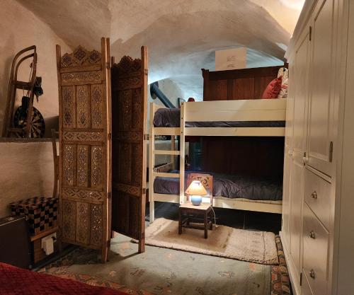 Postel nebo postele na pokoji v ubytování Les clés des pistes