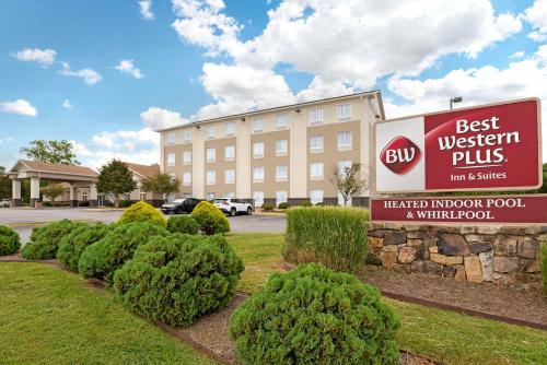 a sign for the best western plus inn and suites at Best Western Plus Crossroads Inn & Suites in Zion Crossroads