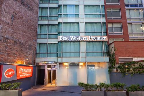 a building with a sign that reads best western premier at Best Western Premier Herald Square in New York