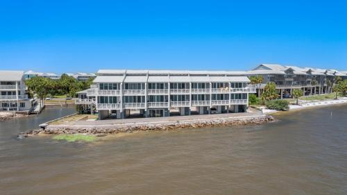 an image of a building on the water at Sunset Harbor 7 in Cedar Key